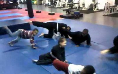 Silat Little Ninja performing round kicks from Sliwa Position